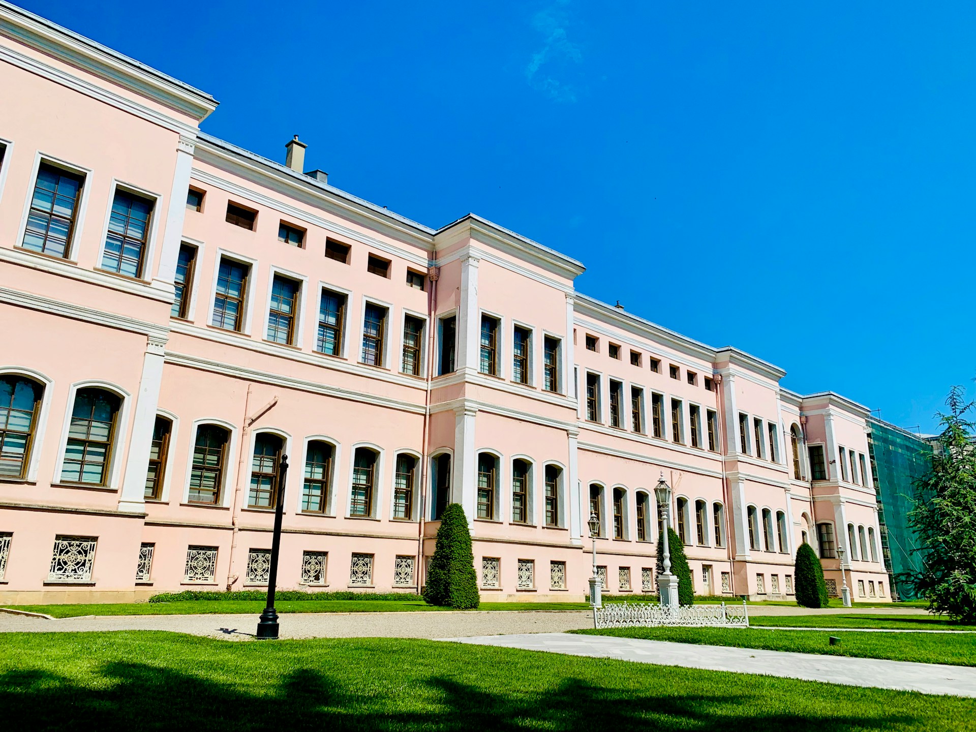 beige concrete building under blue sky during daytime